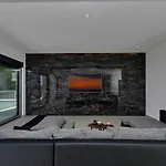 E *